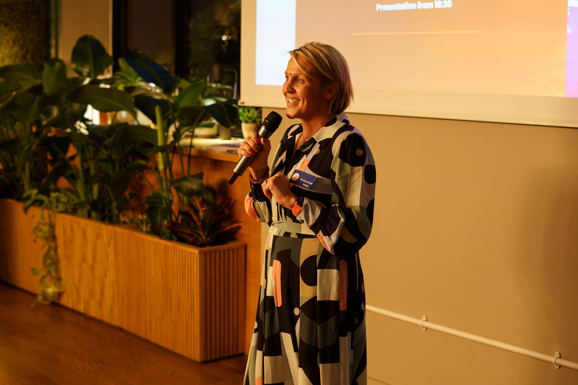 Vanesa presenting at a NoBa Connect event.