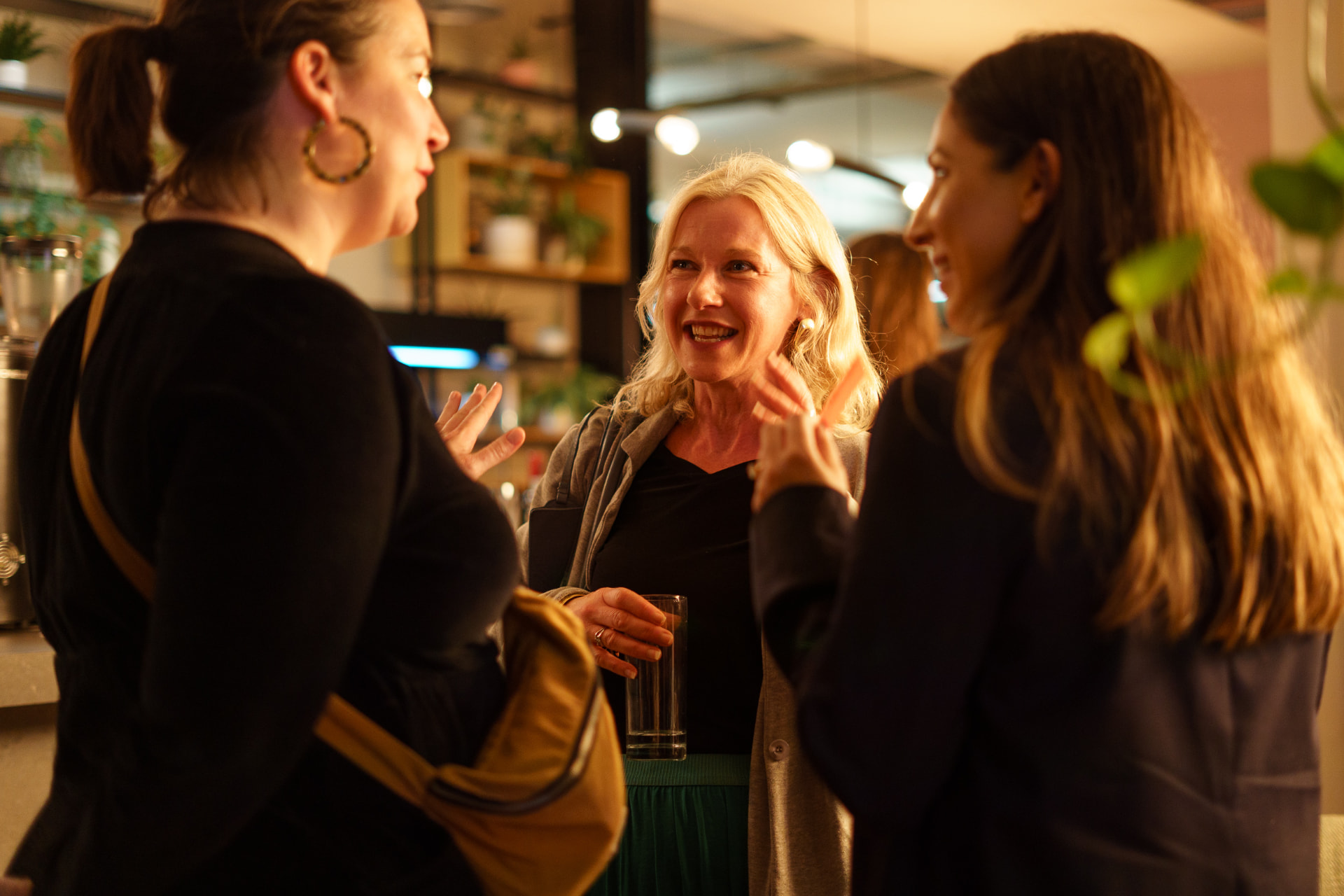 Attendees in conversation at a NoBa Connect event.